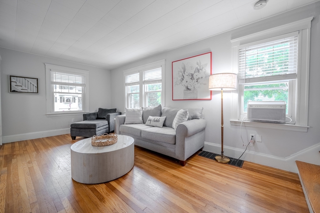 35 Lindenwood Road Stoneham, MA 02180 - Photo 9 of 37 a living room with furniture and a window