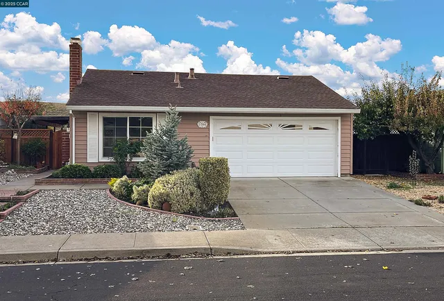 front view of house with a yard