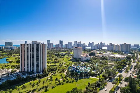 a view of a city with tall buildings