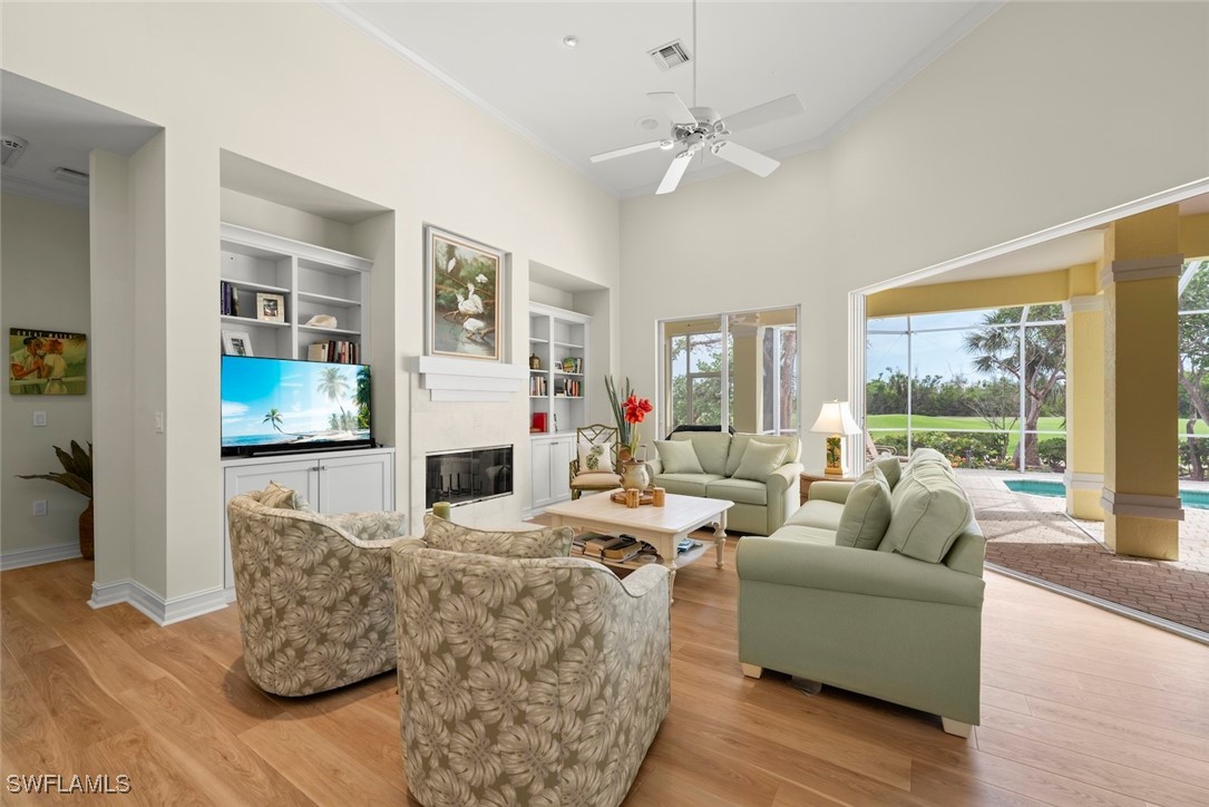 2337 Wulfert Road Sanibel, FL 33957 - Photo 19 of 45 a living room with fireplace furniture and a large window