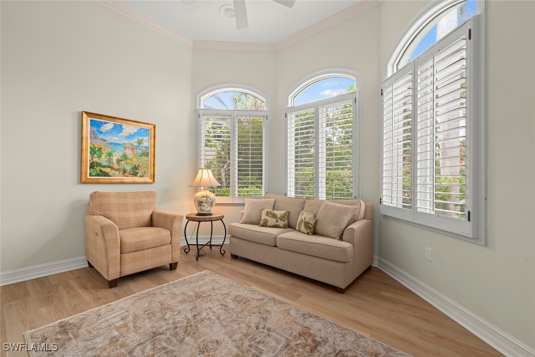 2337 Wulfert Road Sanibel, FL 33957 - Photo 32 of 45 a living room with furniture and a large window
