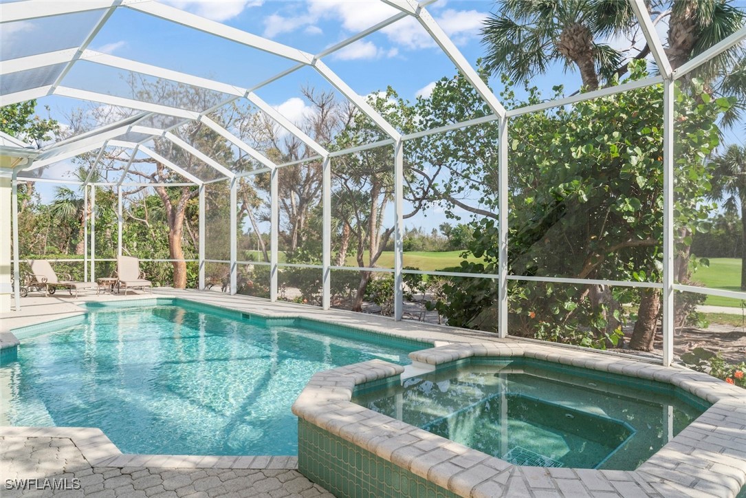 2337 Wulfert Road Sanibel, FL 33957 - Photo 36 of 45 a view of outdoor space with swimming pool