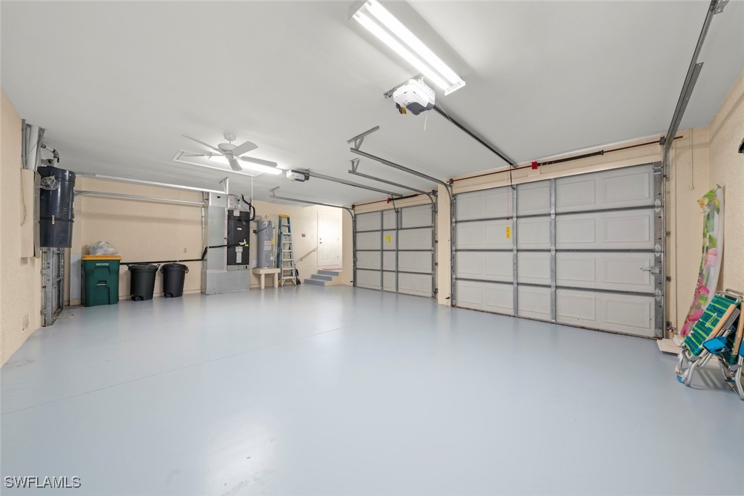 2337 Wulfert Road Sanibel, FL 33957 - Photo 39 of 45 a view of a livingroom with an empty space and a garage