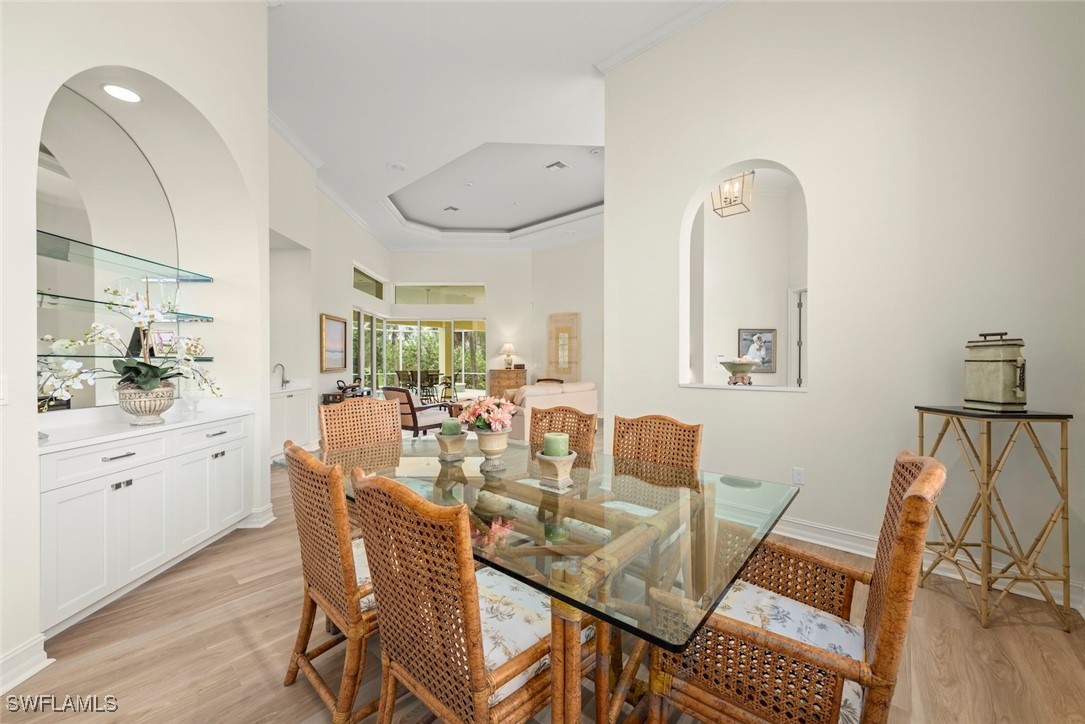 2337 Wulfert Road Sanibel, FL 33957 - Photo 8 of 45 a view of a dining room with furniture