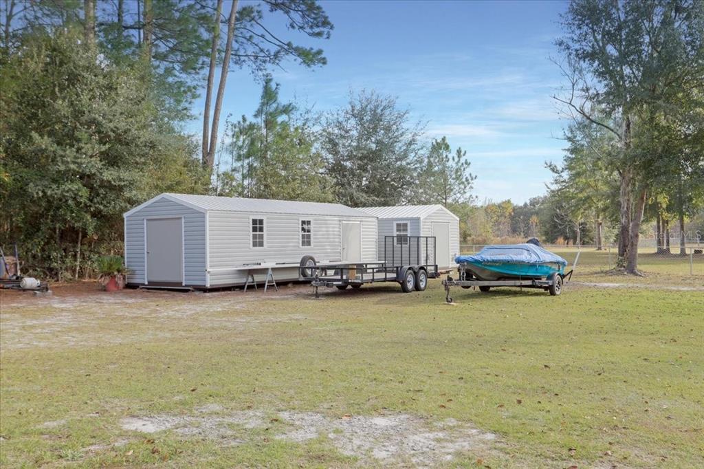 5336 County Road 791 Lake Butler, FL 32054 - Photo 24 of 25 a view of a house with backyard and sitting area