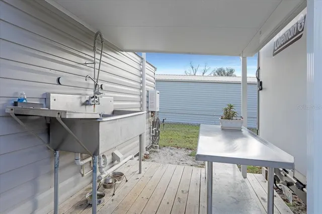 a workspace with furniture and wooden floor