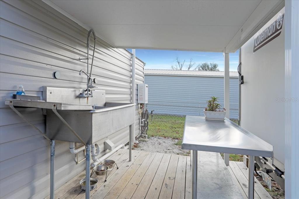 5336 County Road 791 Lake Butler, FL 32054 - Photo 4 of 25 a workspace with furniture and wooden floor