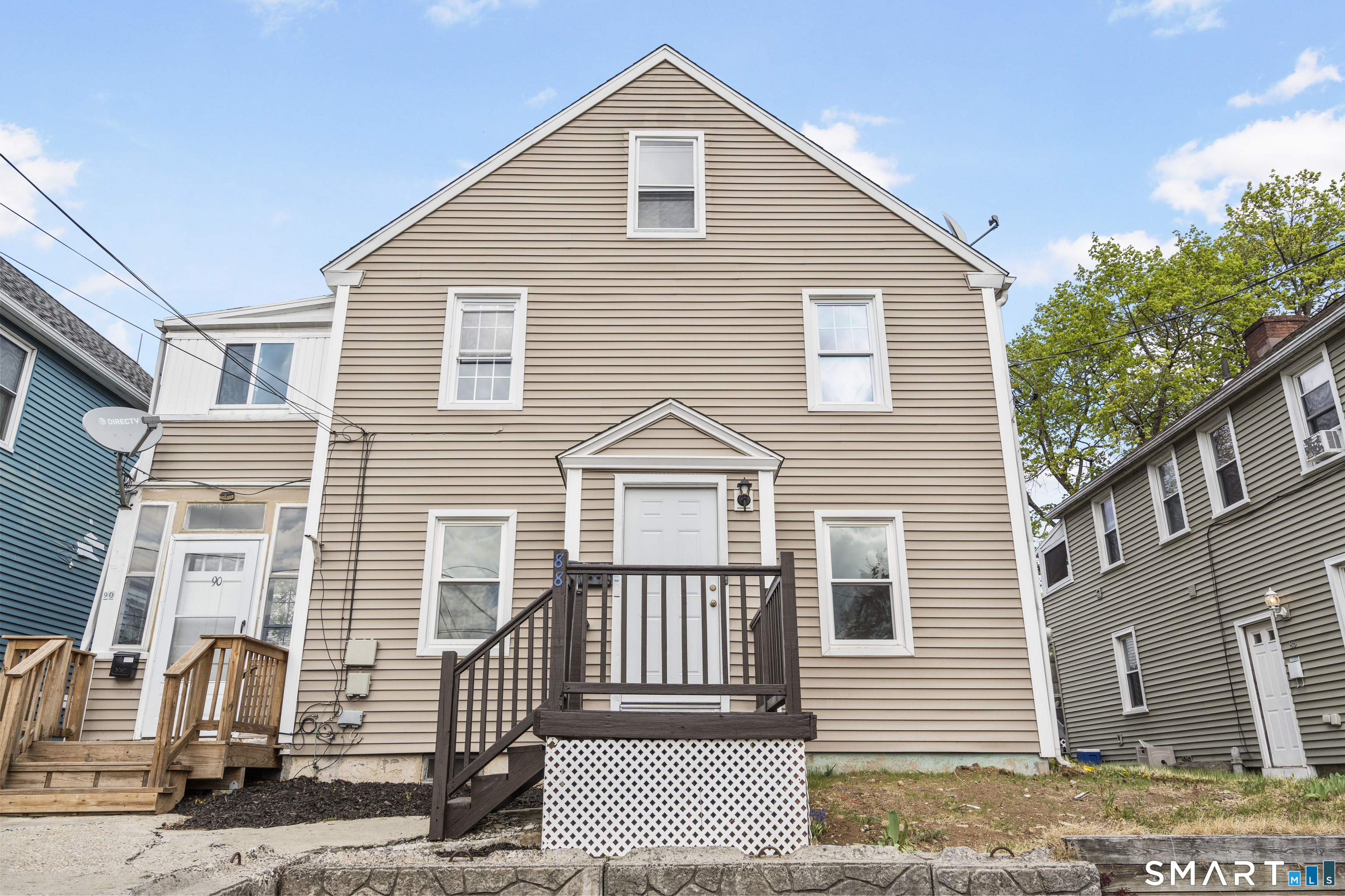 88 North Pond Street Bristol, CT 06010 - Photo 1 of 32 a front view of a house with a yard