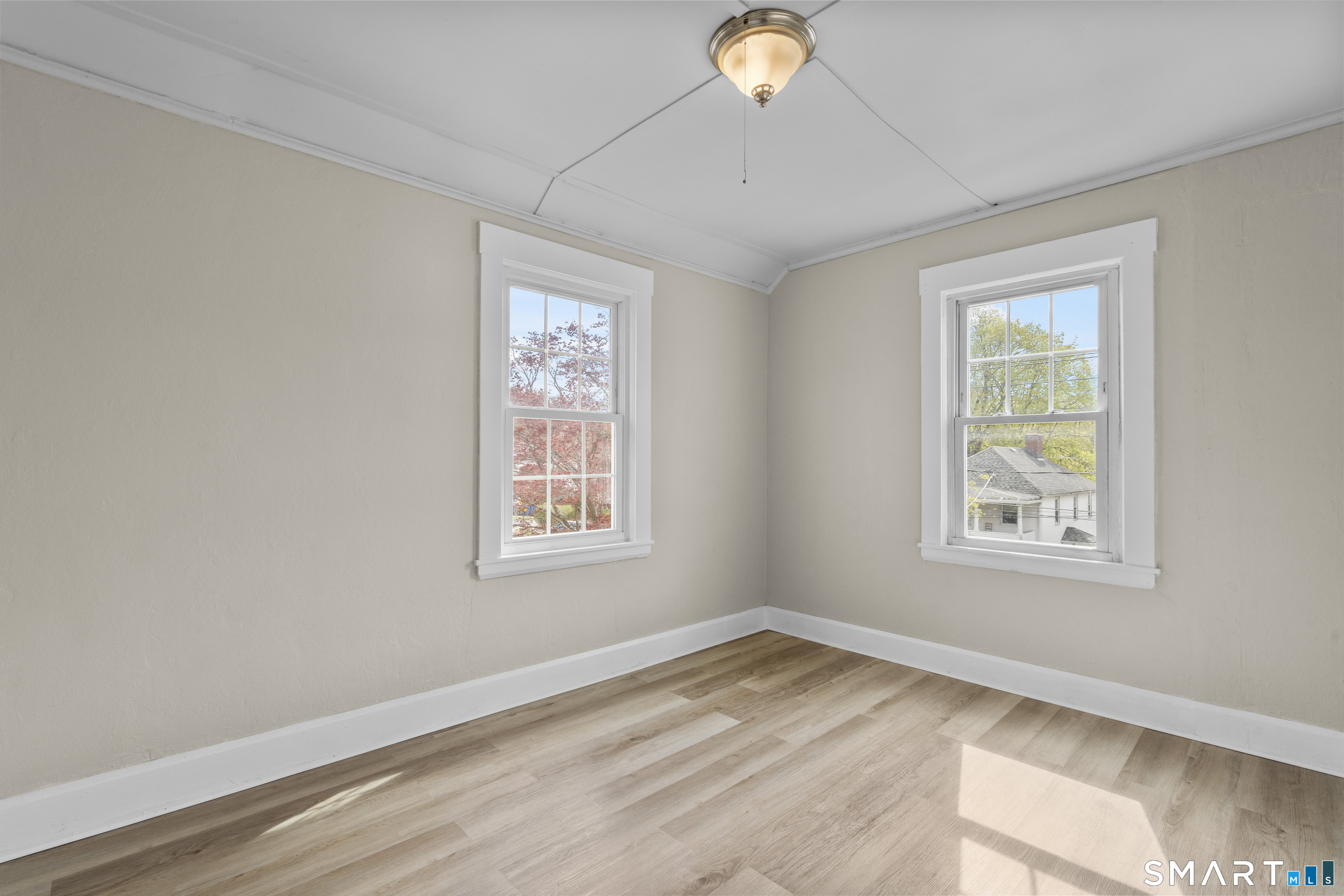 88 North Pond Street Bristol, CT 06010 - Photo 24 of 32 a view of empty room with wooden floor and window