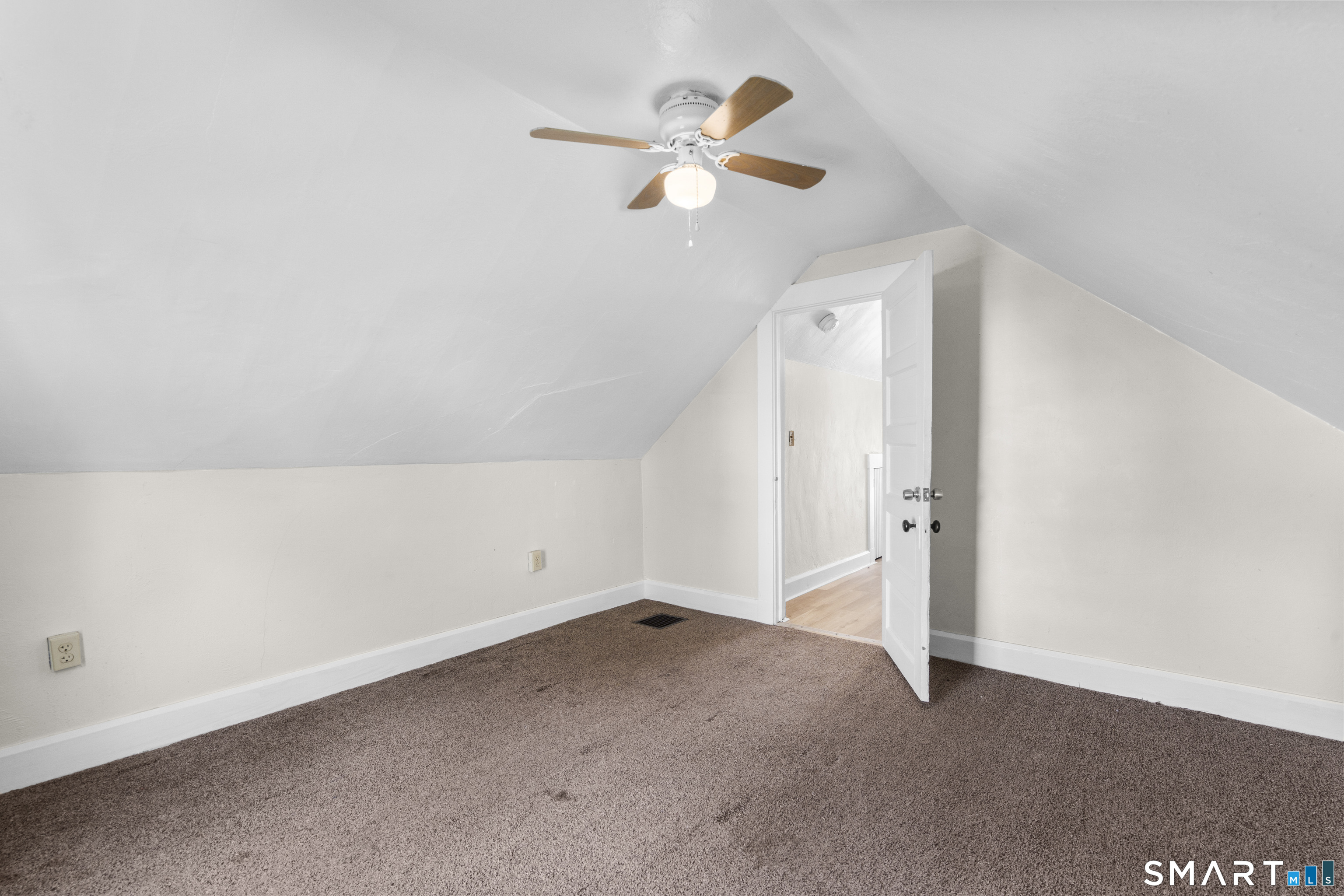 88 North Pond Street Bristol, CT 06010 - Photo 30 of 32 an empty room with a ceiling fan and window