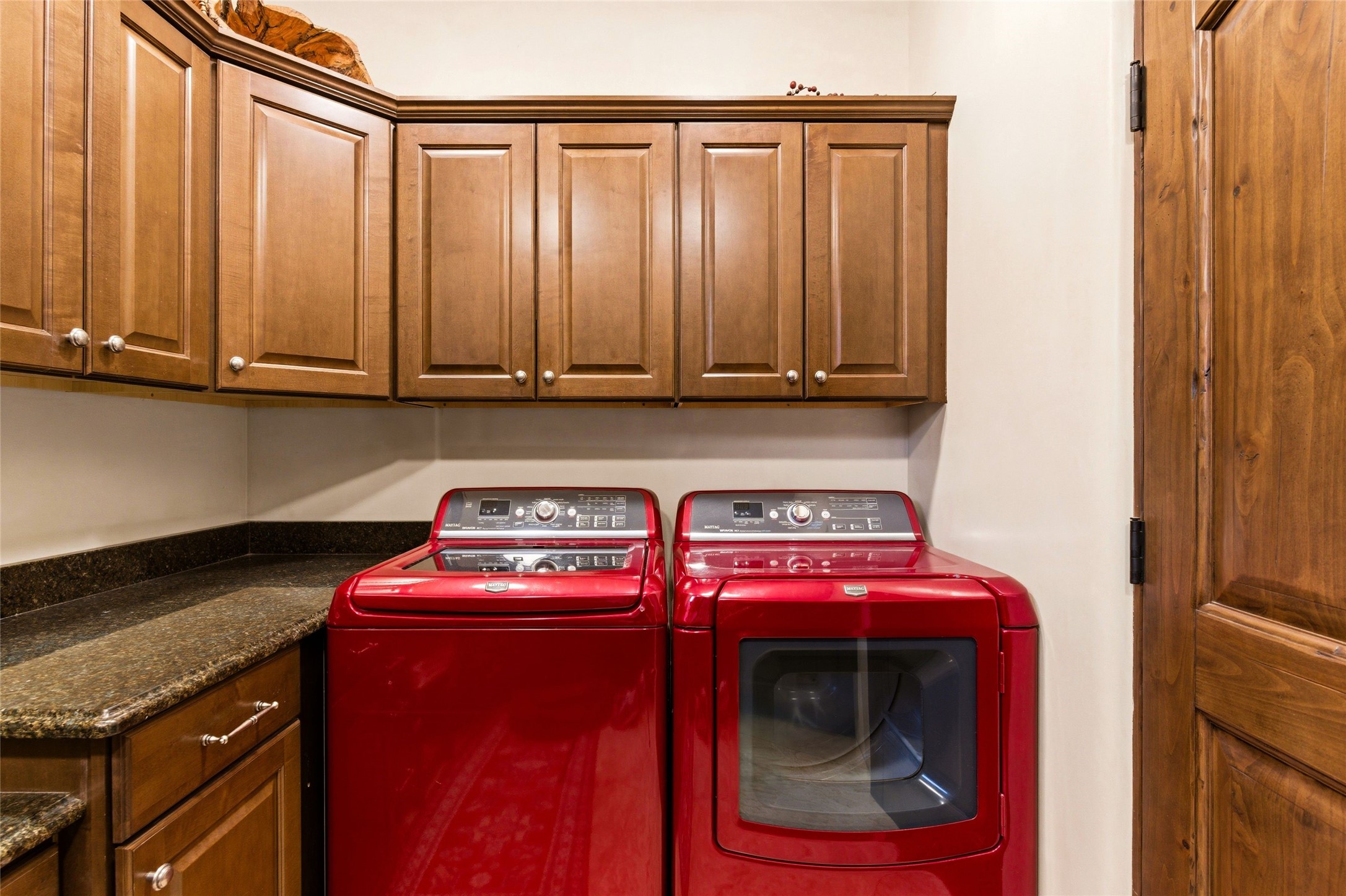 42 San Juan Ranch Road Santa Fe, NM 87506 - Photo 27 of 49 Built-in cabinetry in Laundry Room