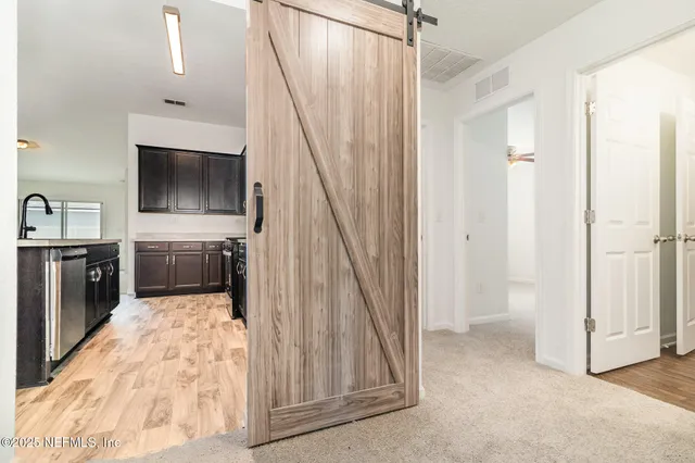 a view of a living room washer and dryer