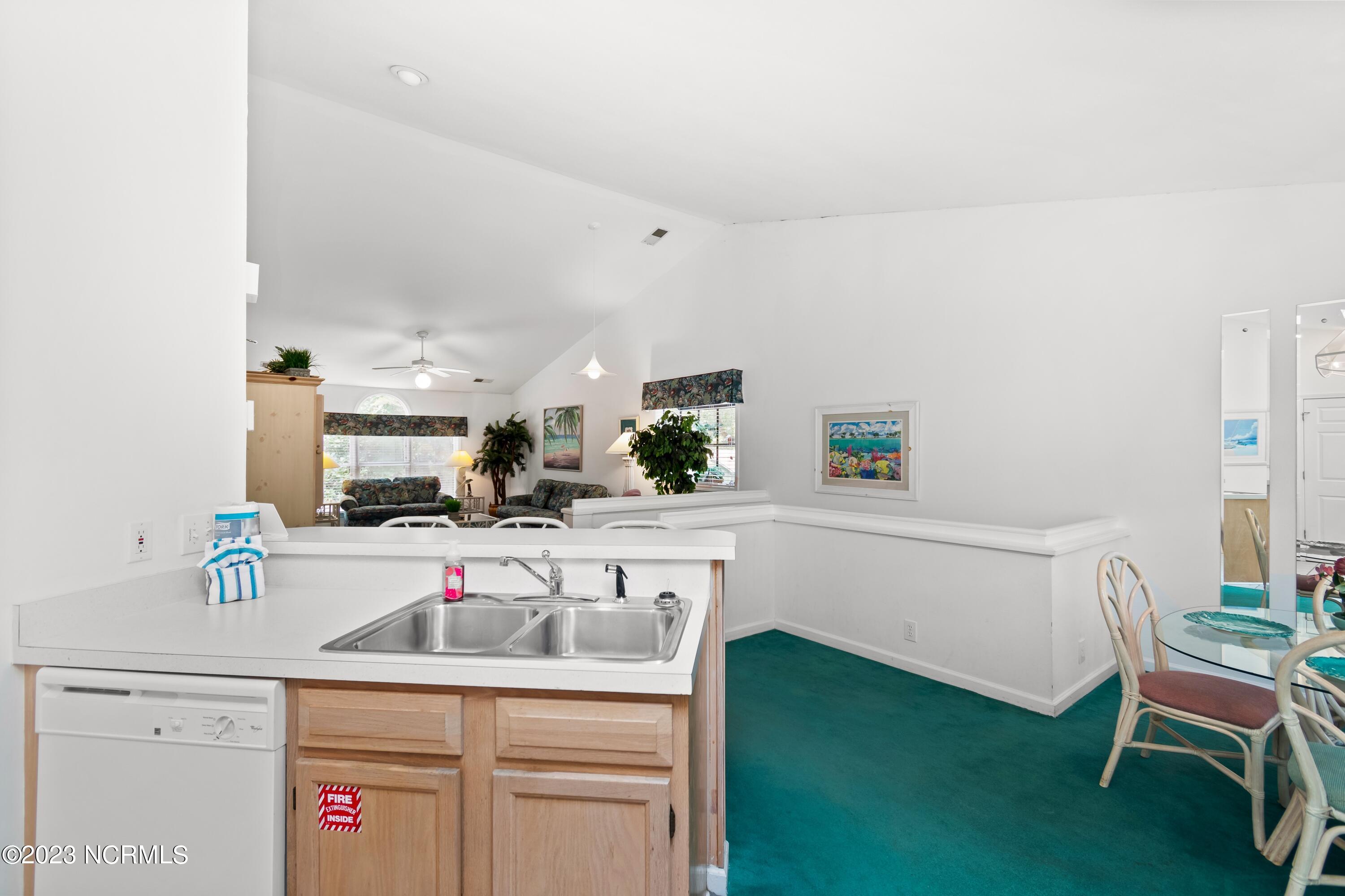 226 Clubhouse Road, Unit 17D Sunset Beach, NC 28468 - Photo 22 of 37 The open concept continues in the upstairs unit.