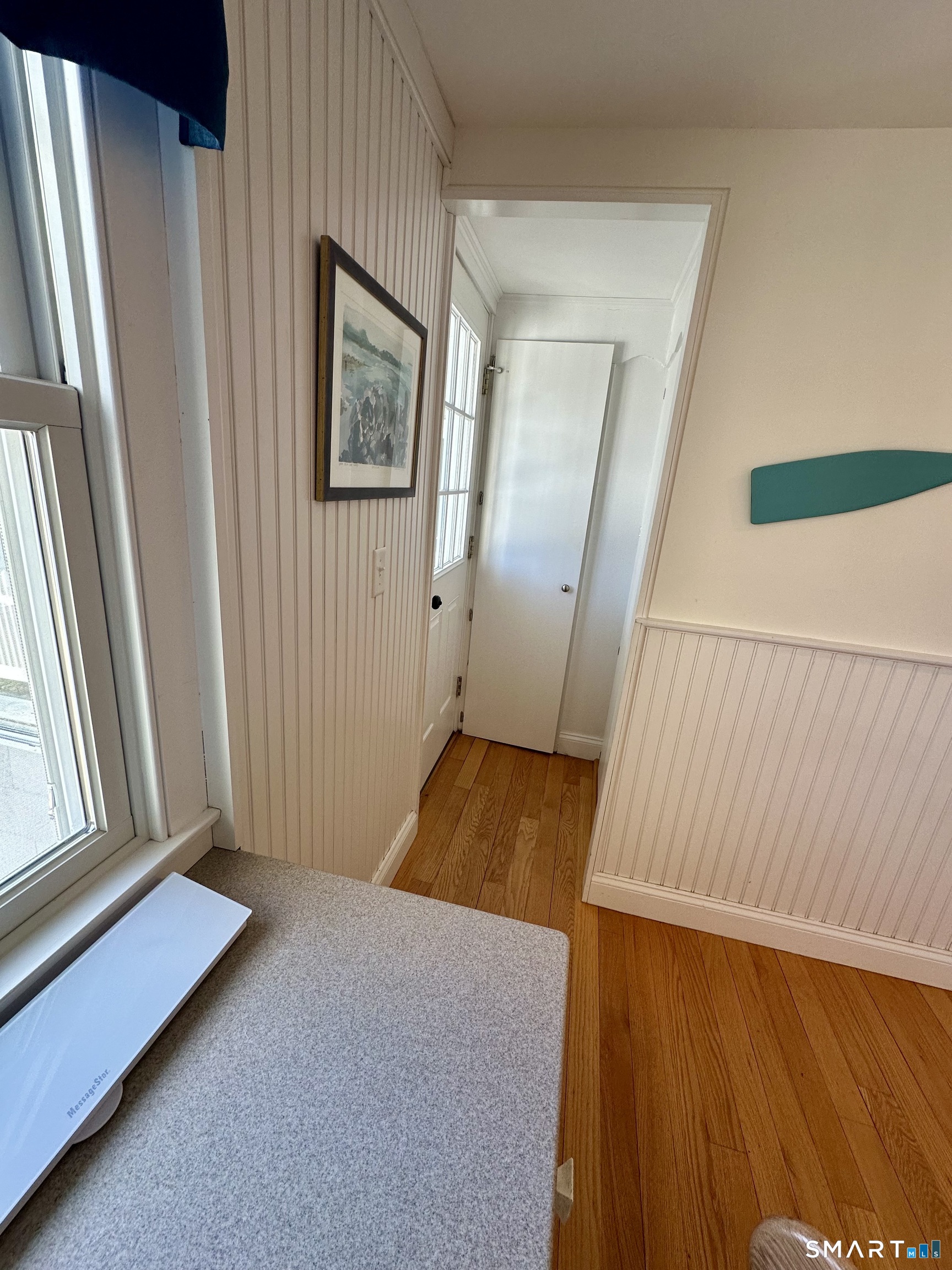 36 Attawan Road East Lyme, CT 06357 - Photo 12 of 40 Side door Entrance Foyer to Enclosed Porch. TWO Storage closets.