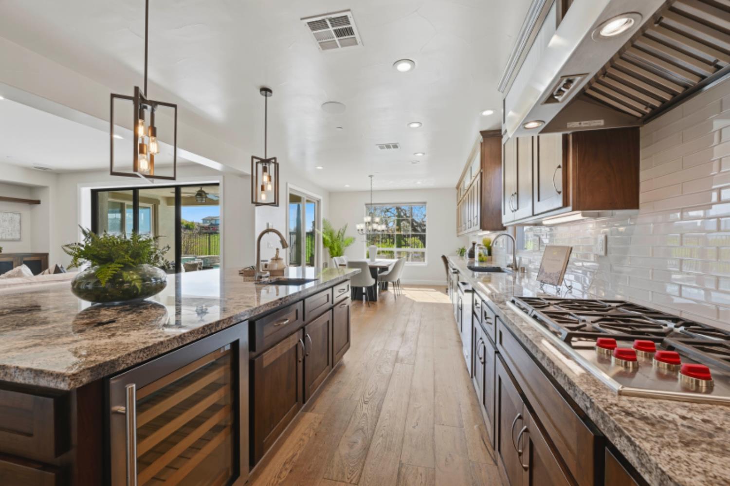 2714 Hidden Trail Loop Rocklin, CA 95765 - Photo 14 of 57 a kitchen with granite countertop lots of counter top space