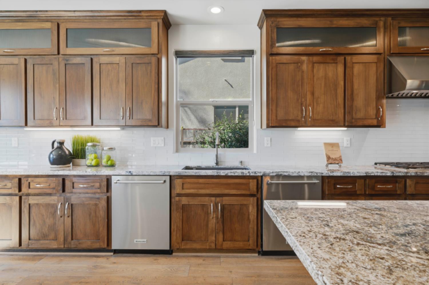 2714 Hidden Trail Loop Rocklin, CA 95765 - Photo 16 of 57 a kitchen with stainless steel appliances granite countertop a stove and a sink