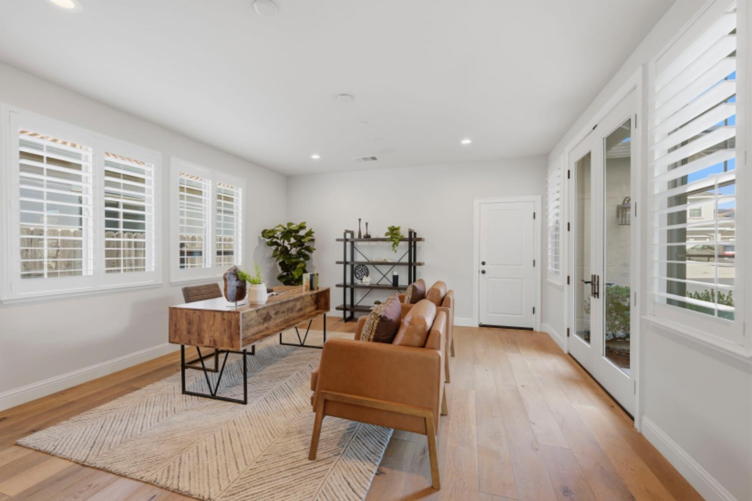 2714 Hidden Trail Loop Rocklin, CA 95765 - Photo 18 of 57 a living room with furniture and a wooden floor