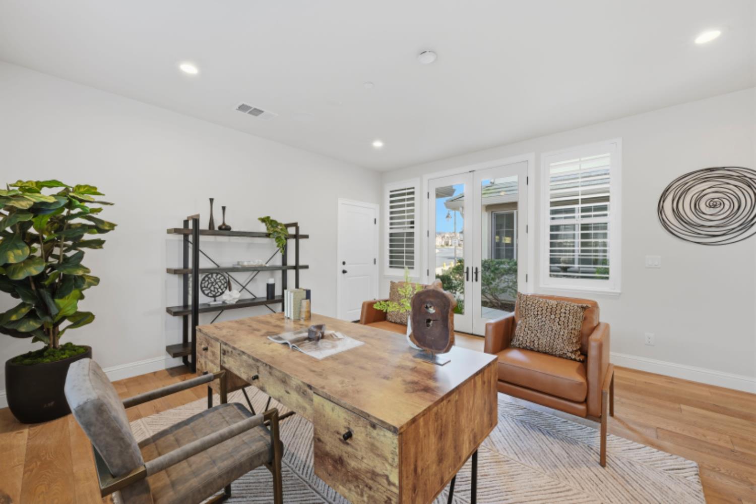 2714 Hidden Trail Loop Rocklin, CA 95765 - Photo 19 of 57 a living room with furniture and a potted plant