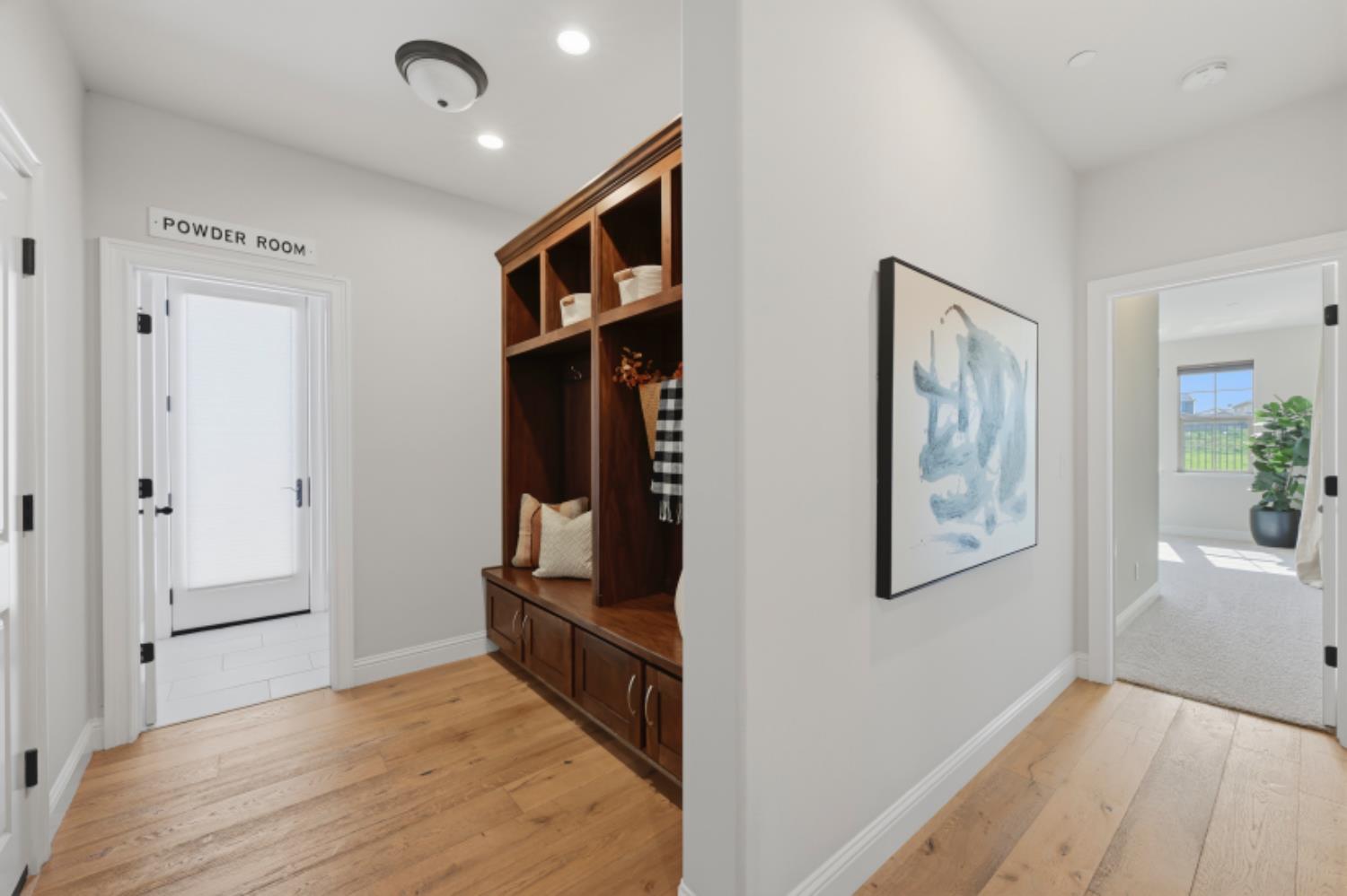2714 Hidden Trail Loop Rocklin, CA 95765 - Photo 20 of 57 a view of hallway with window and wooden floor