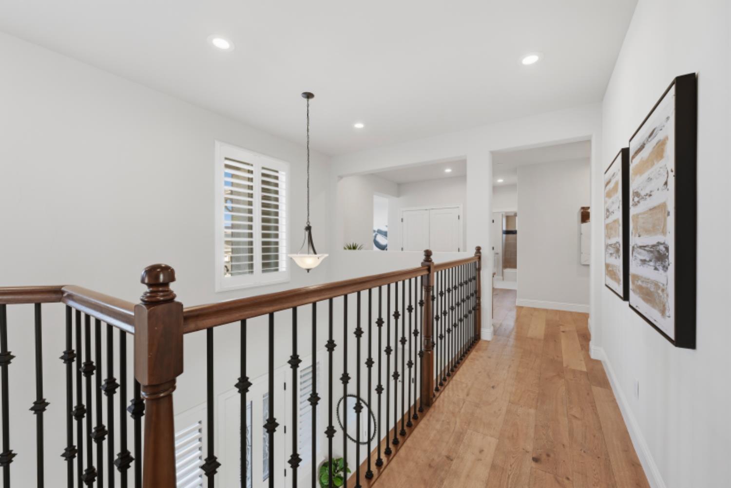 2714 Hidden Trail Loop Rocklin, CA 95765 - Photo 26 of 57 a view of hallway with wooden floor and windows