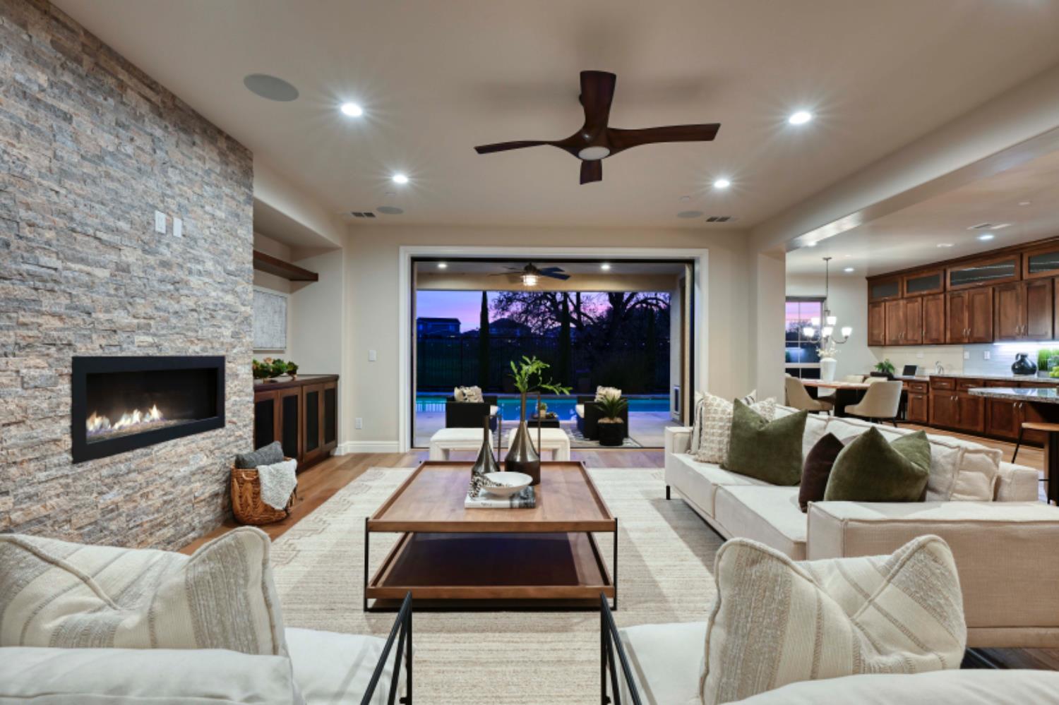 2714 Hidden Trail Loop Rocklin, CA 95765 - Photo 6 of 57 a living room with furniture and a flat screen tv