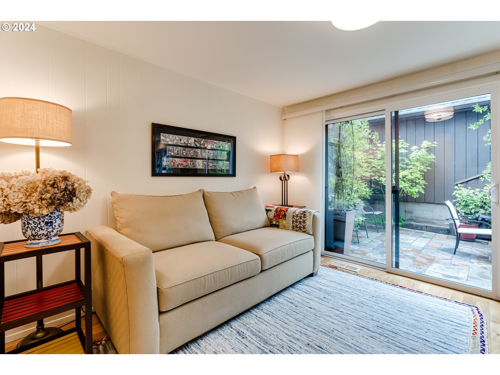 145 Westbrook Way Eugene, OR 97405 - Photo 20 of 48 a living room with furniture and a lamp