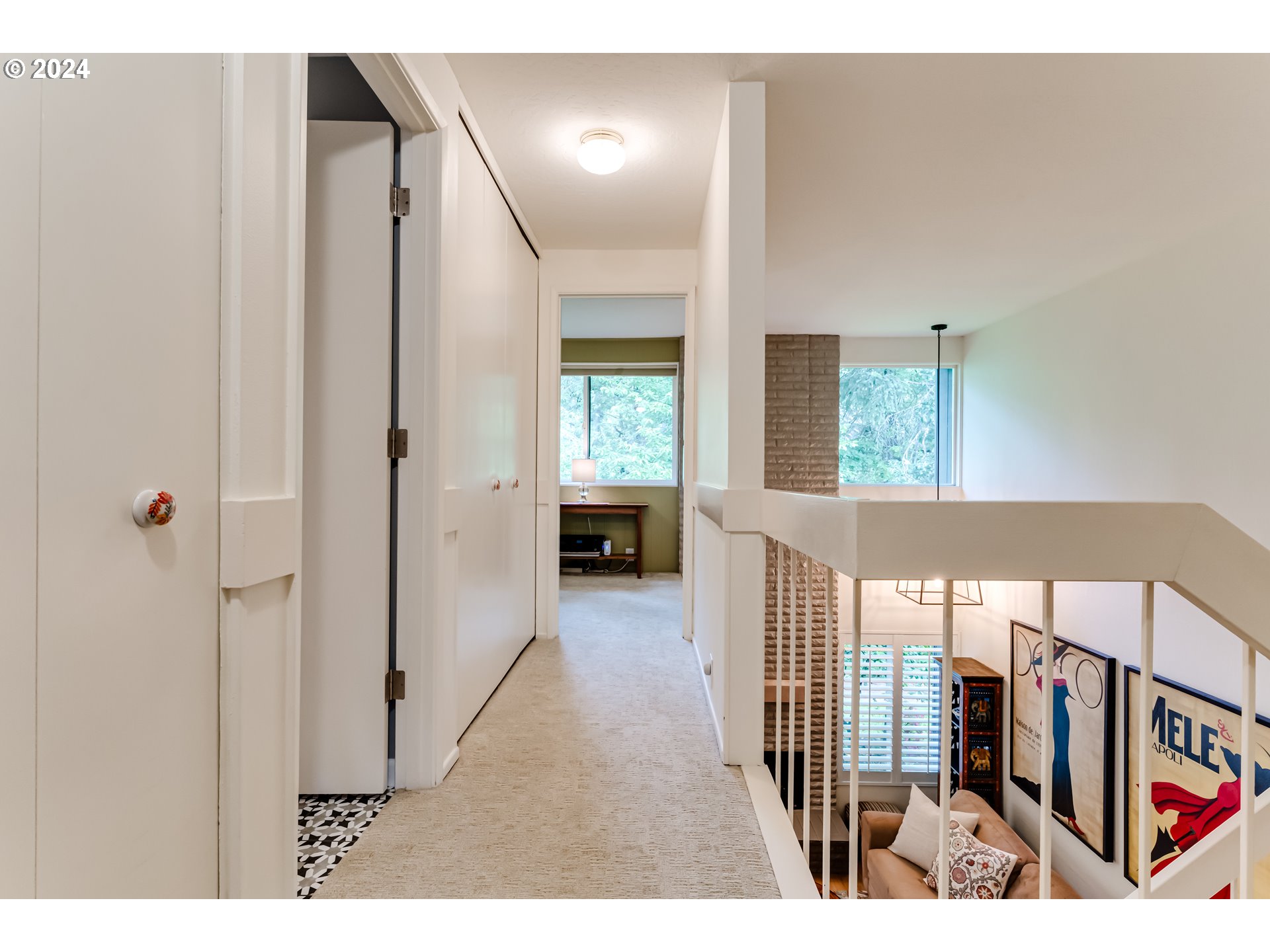 145 Westbrook Way Eugene, OR 97405 - Photo 26 of 48 a view of a hallway with wooden floor and windows