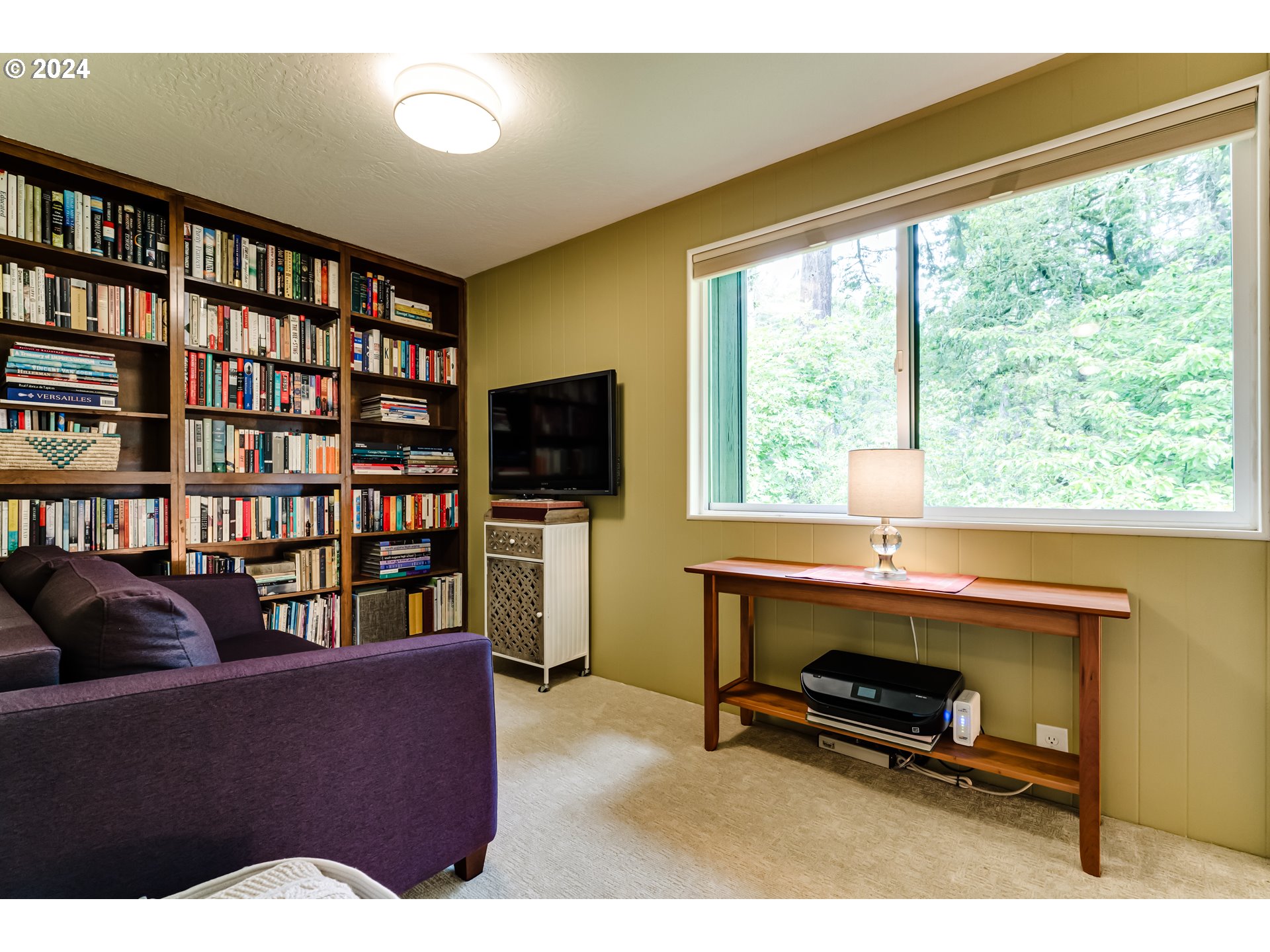 145 Westbrook Way Eugene, OR 97405 - Photo 36 of 48 a living room with furniture a rug and a large window