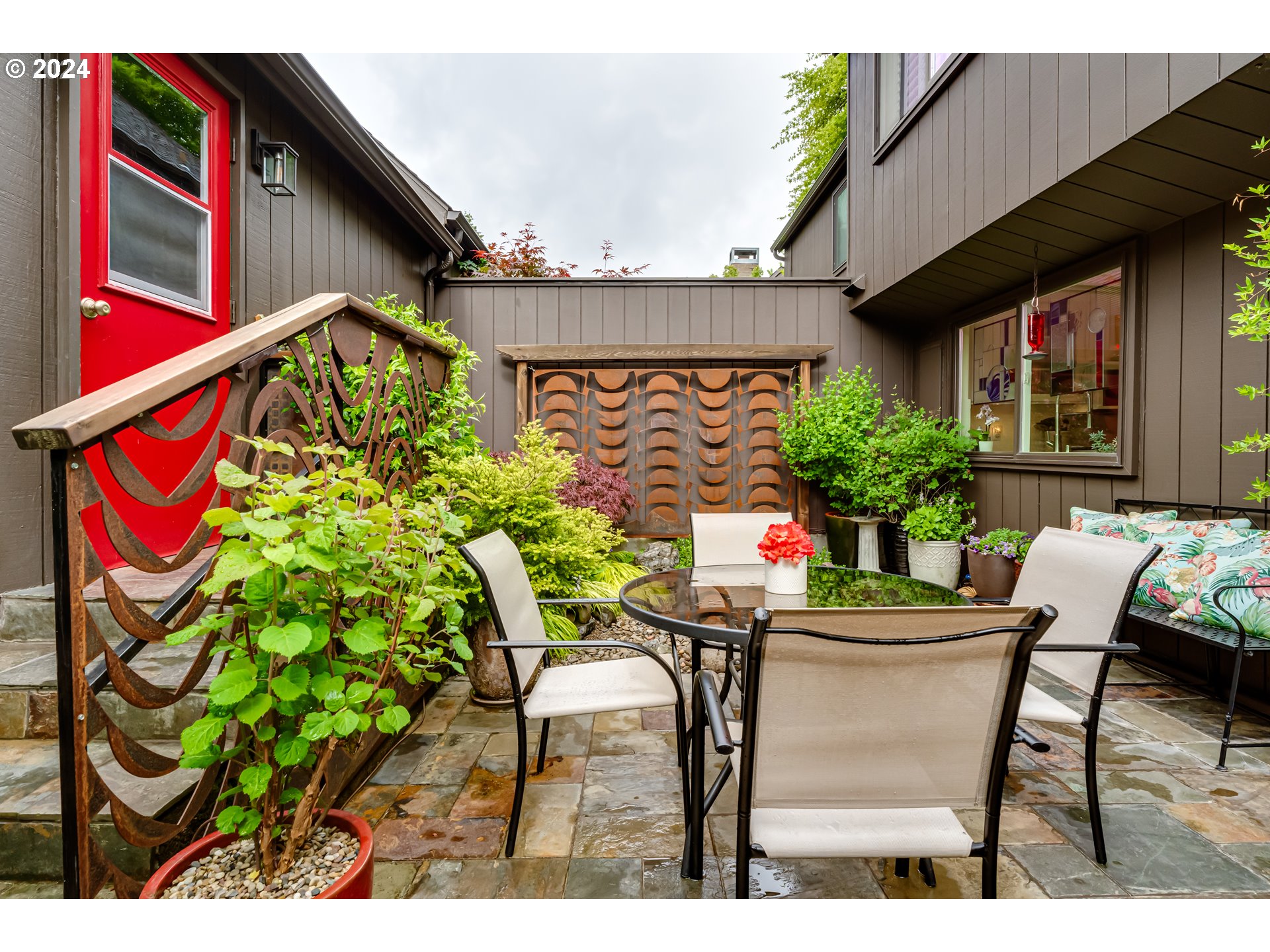 145 Westbrook Way Eugene, OR 97405 - Photo 40 of 48 a view of an chairs and table in a patio