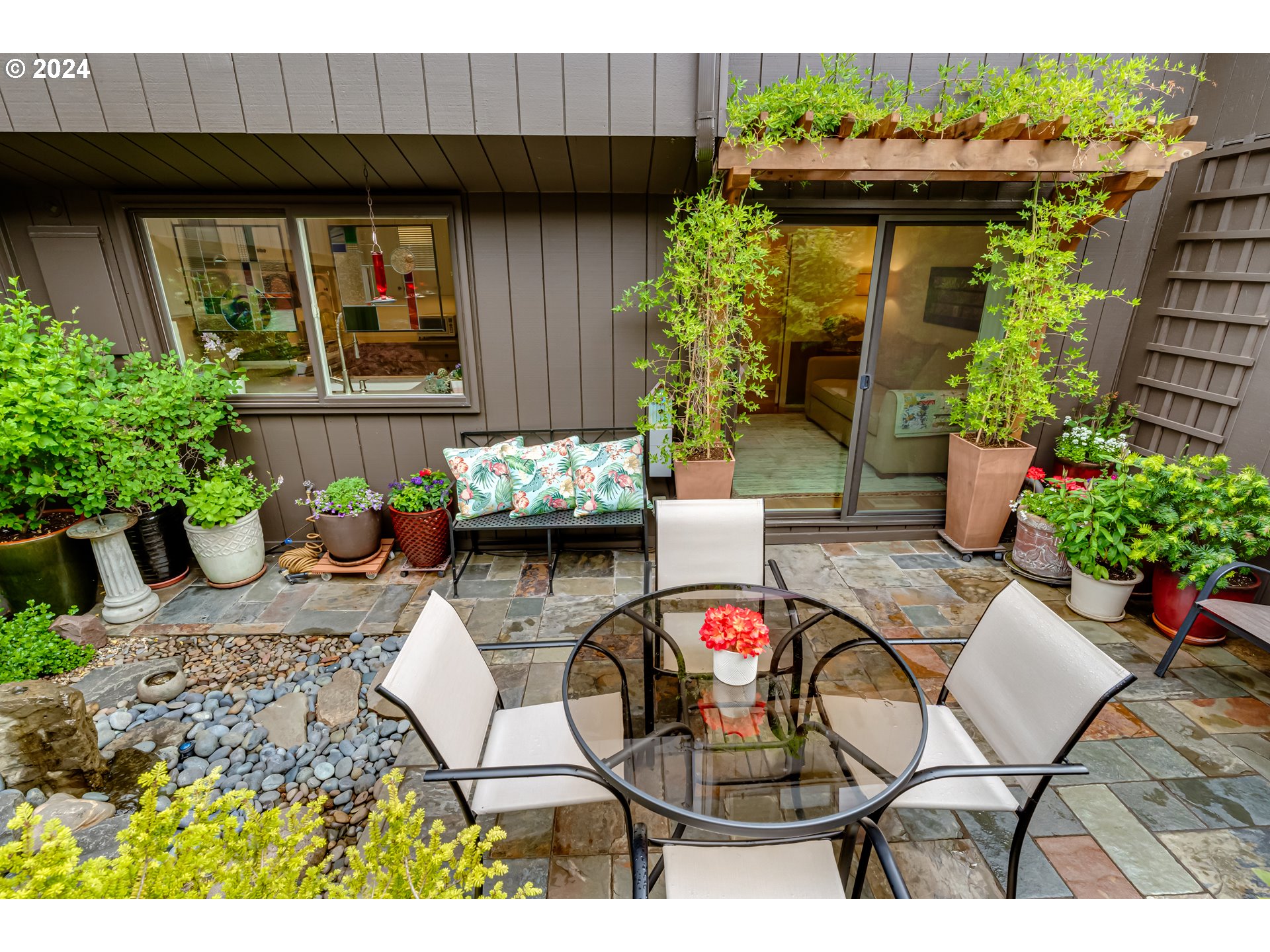 145 Westbrook Way Eugene, OR 97405 - Photo 43 of 48 a view of a chairs and table in patio