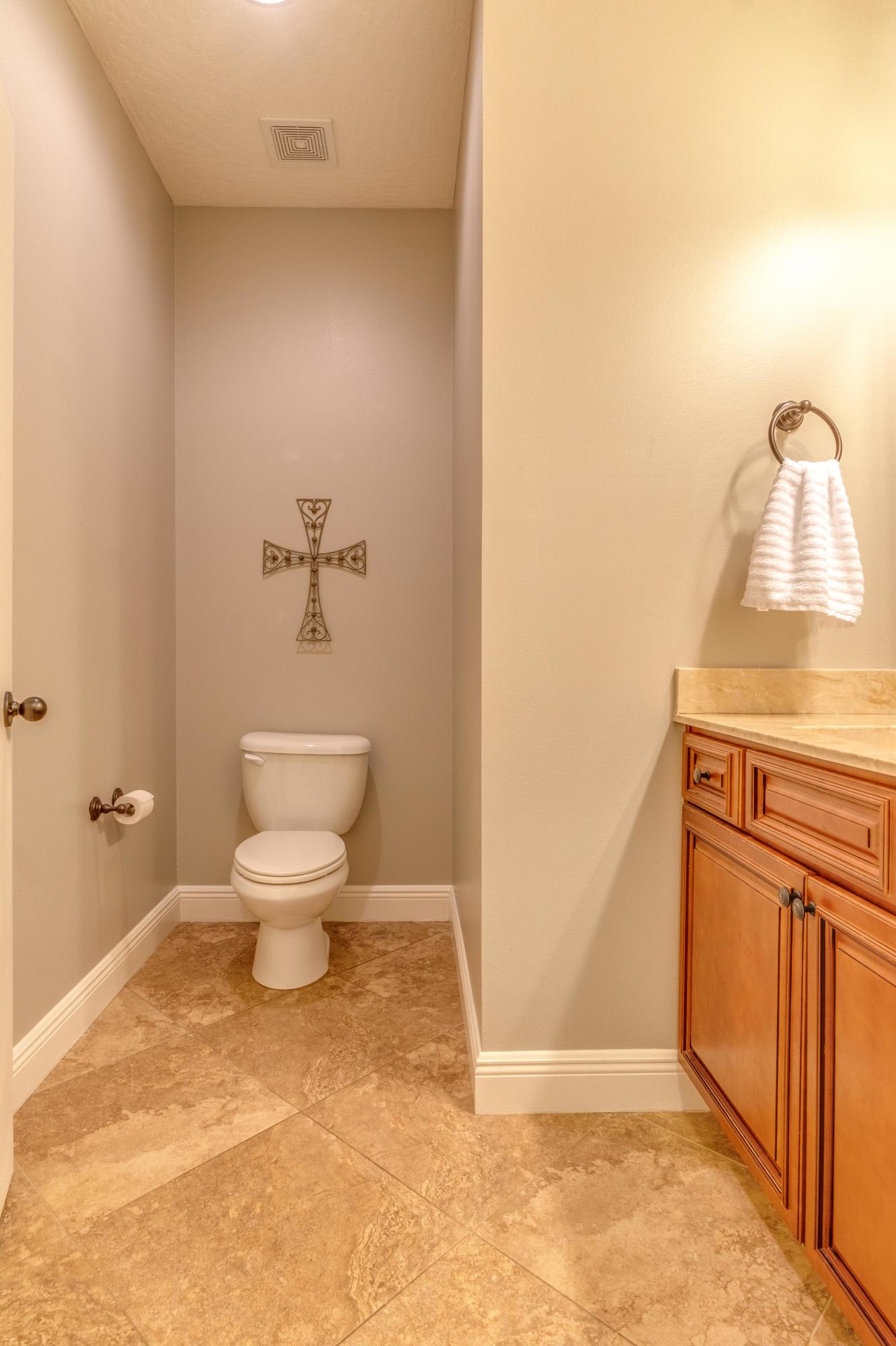 4624 Hermosa Road Crestview, FL 32539 - Photo 24 of 32 a bathroom with a toilet