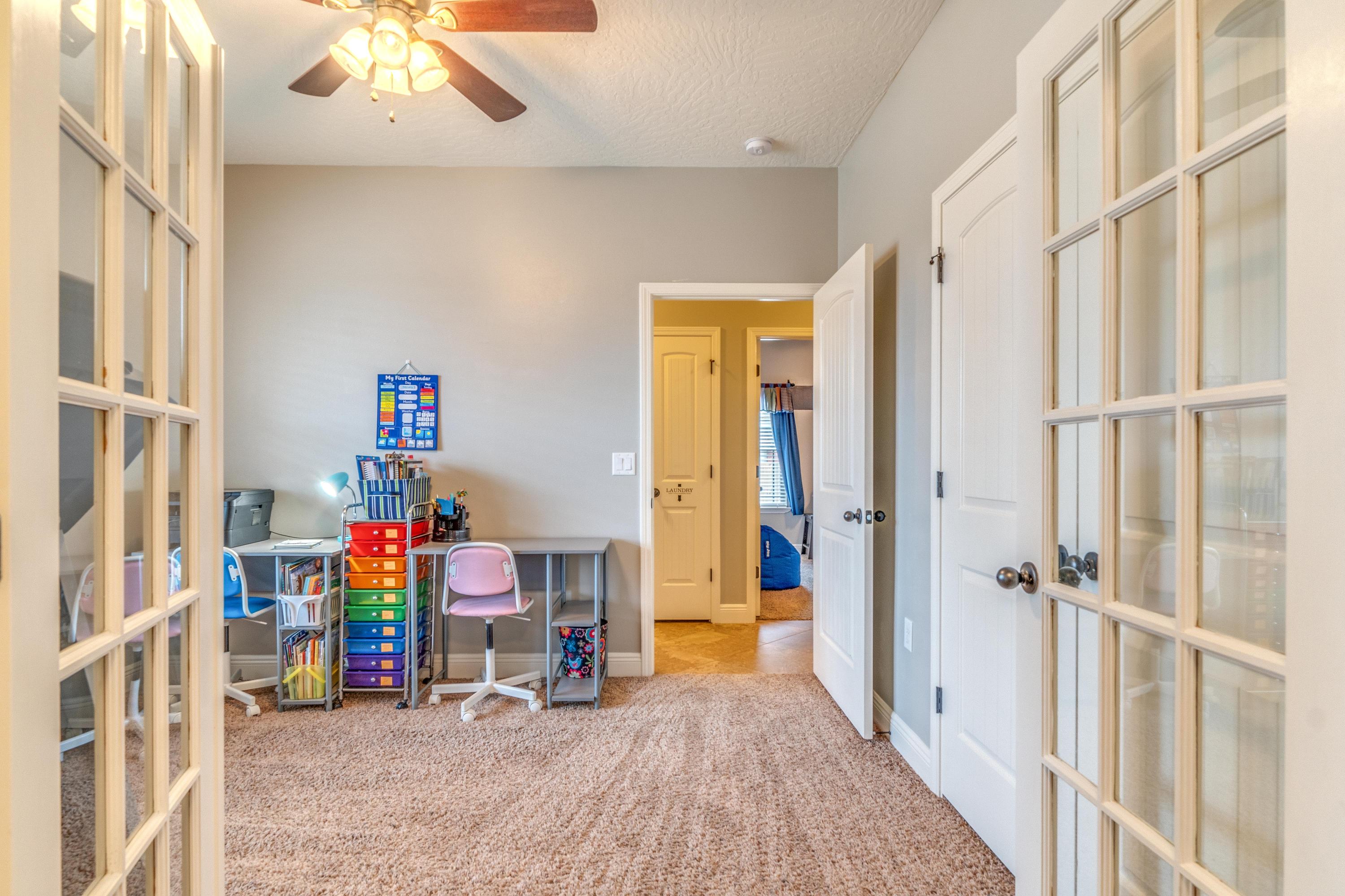 4624 Hermosa Road Crestview, FL 32539 - Photo 3 of 32 a view of an entryway with wooden floor