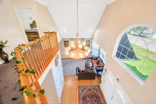 a bathroom with a sink mirror and toilet