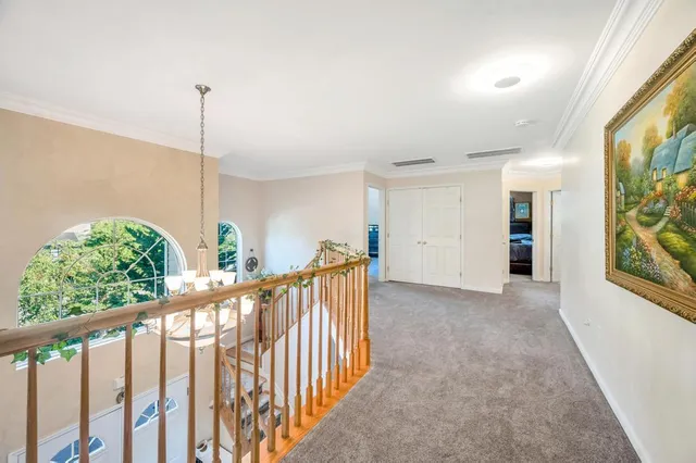 a view of hallway with stairs