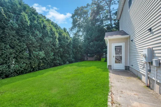 a view of a porch with a yard