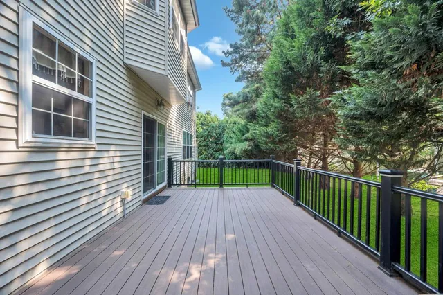 a view of a backyard with a deck