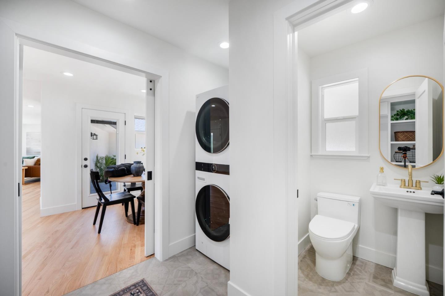 2275 Llagas Road Morgan Hill, CA 95037 - Photo 11 of 56 a bathroom with a toilet a sink and a mirror