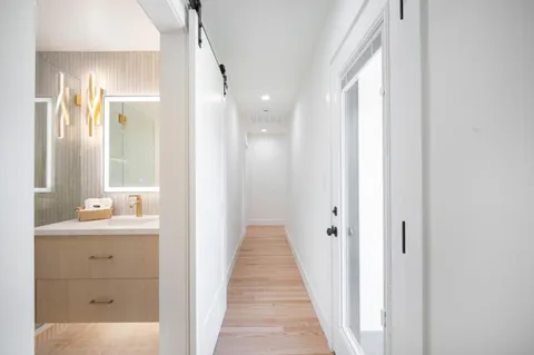 a bedroom with a bed and a table