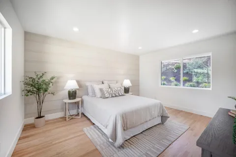 a view of a fountain in front of a house