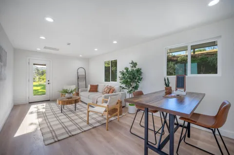 a view of a terrace with sitting area