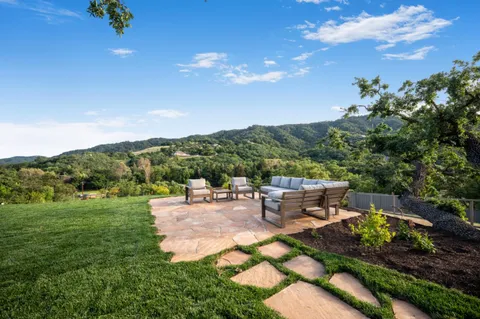 a view of a garden with a bench