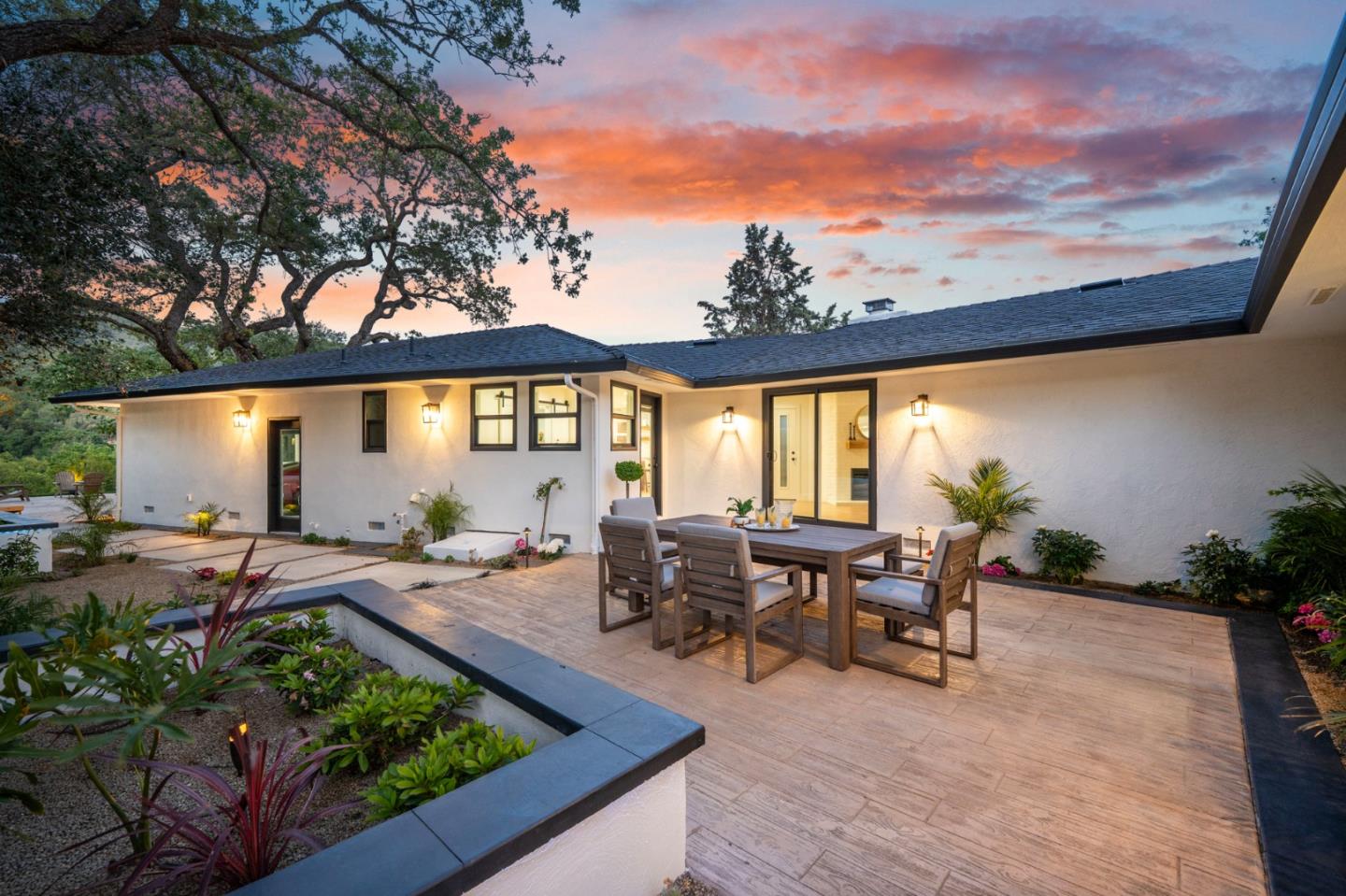 2275 Llagas Road Morgan Hill, CA 95037 - Photo 55 of 56 a view of a patio with table and chairs potted plants with wooden floor and fence