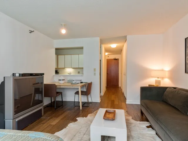 a living room with a couch and a coffee table