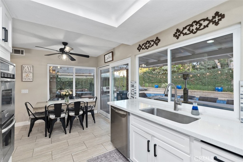 21526 Vía Serpiente Lake Forest, CA 92630 - Photo 11 of 51 a view of a dining room with furniture window and outside view