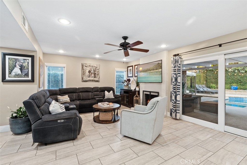 21526 Vía Serpiente Lake Forest, CA 92630 - Photo 13 of 51 a living room with furniture and a large window