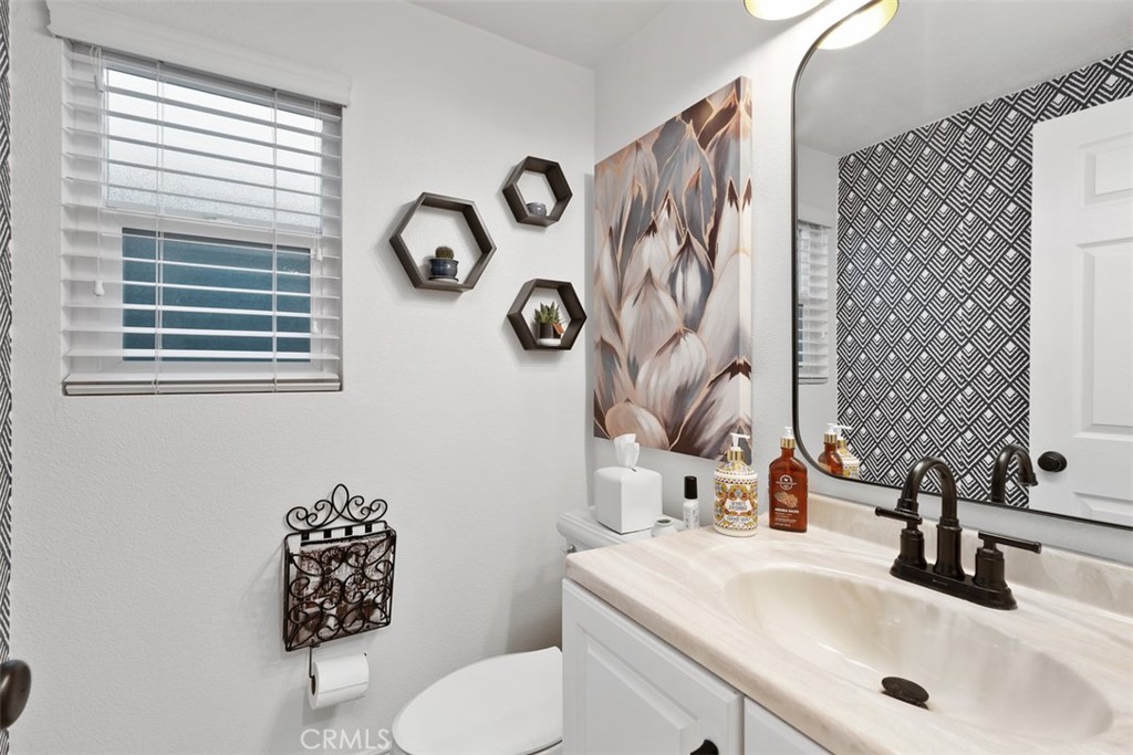 21526 Vía Serpiente Lake Forest, CA 92630 - Photo 18 of 51 a bathroom with a sink and a toilet
