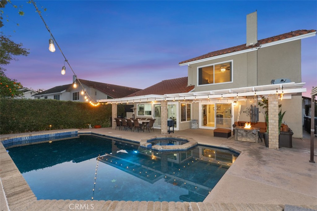 21526 Vía Serpiente Lake Forest, CA 92630 - Photo 2 of 51 a view of a swimming pool with sitting area