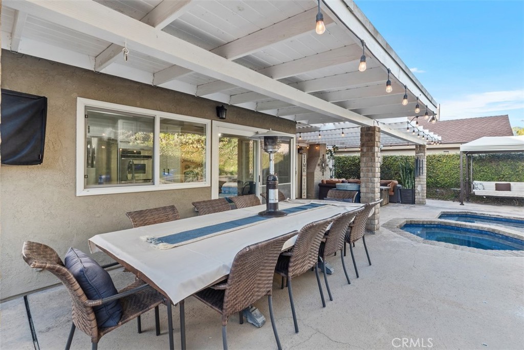 21526 Vía Serpiente Lake Forest, CA 92630 - Photo 29 of 51 a dining room with furniture and window