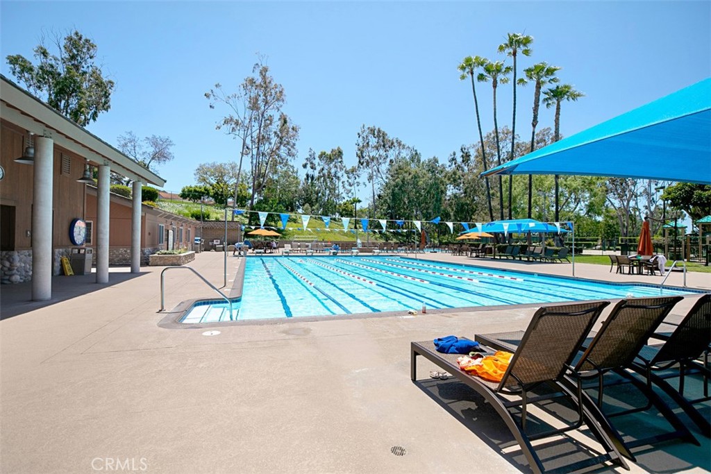 21526 Vía Serpiente Lake Forest, CA 92630 - Photo 38 of 51 a view of a swimming pool with a lounge chair