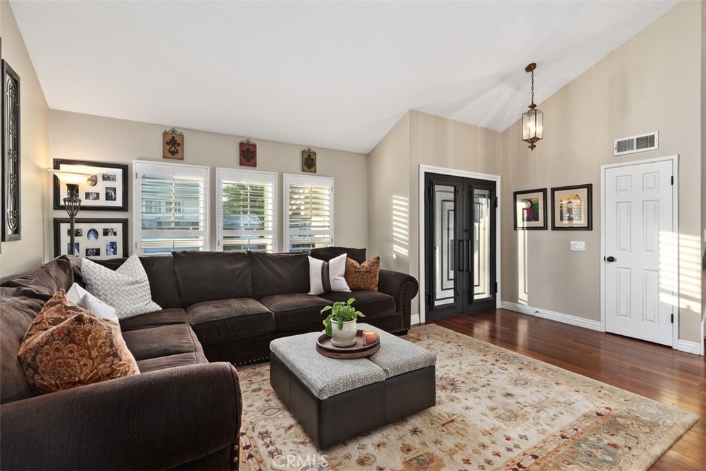 21526 Vía Serpiente Lake Forest, CA 92630 - Photo 4 of 51 a living room with furniture and a wooden floor
